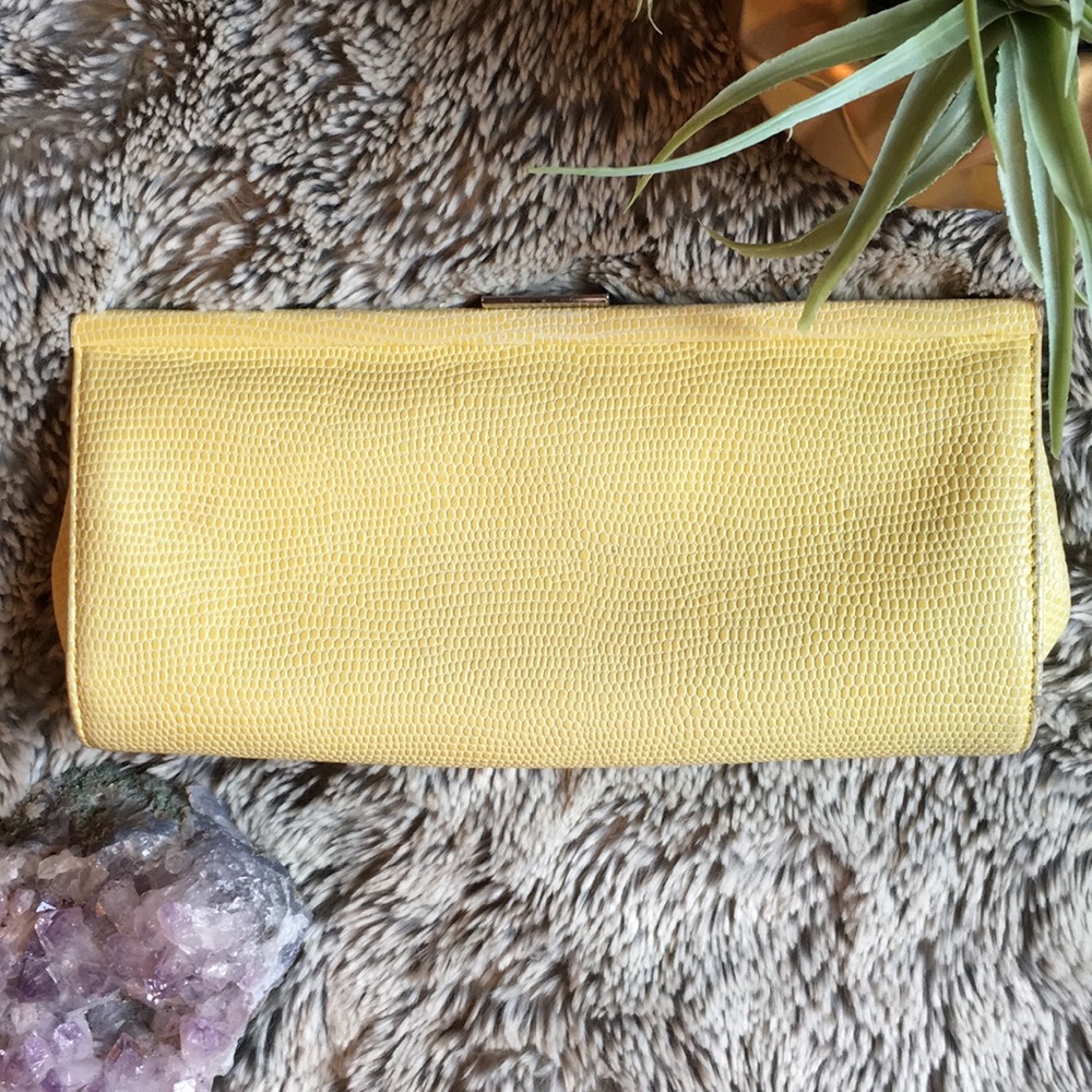 Pale yellow faux python clutch